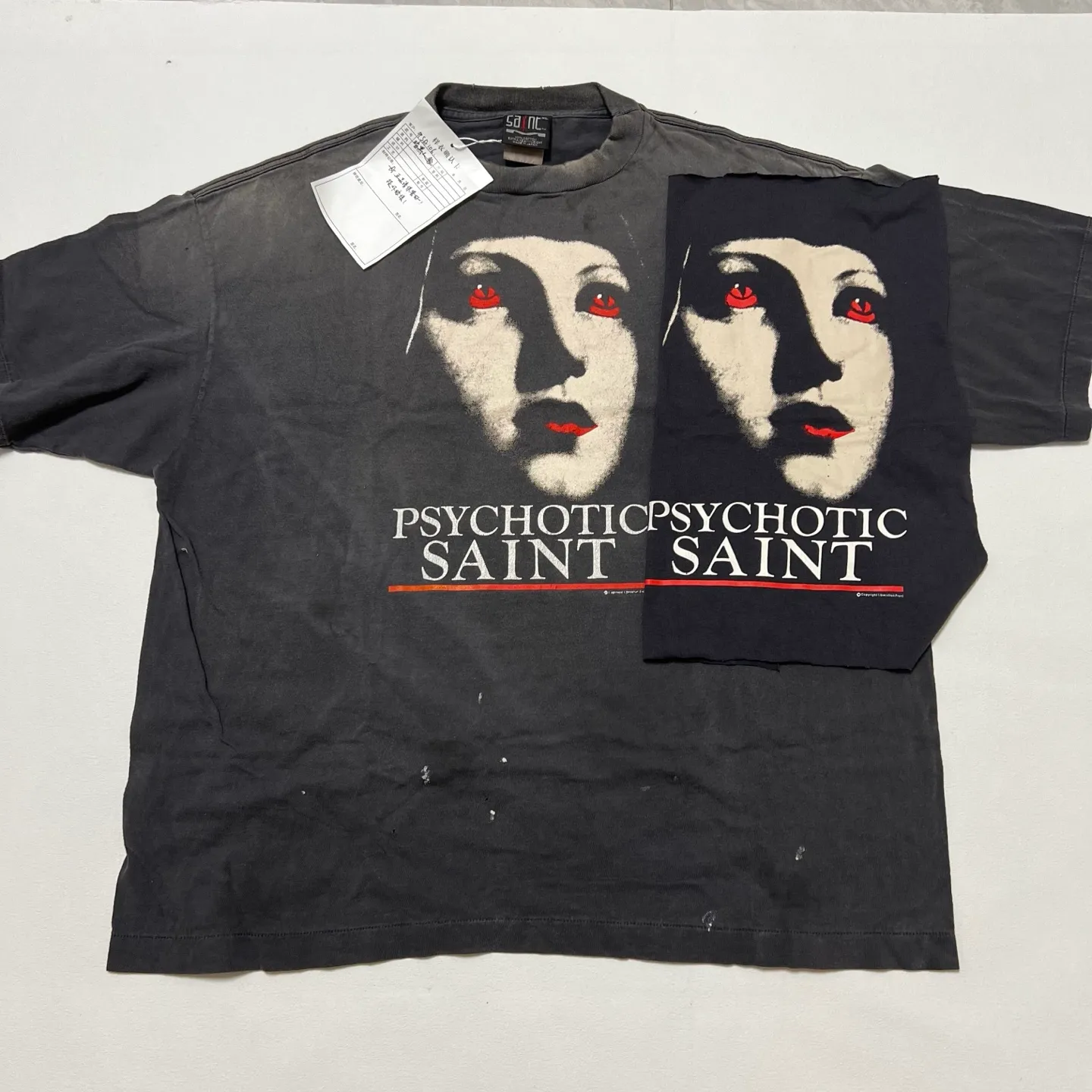 Printing proofing comparison SAINT Mxxxxxx SS TEE/PSYCHOTIC SNT/BLK Gothic heavy metal rock style retro short-sleeved Mysterious woman's face printed distressed TEE Washed black S-XL Same as the original version Cylindrical side seam OE gauze fabric Garment dyeing Faded by heavy washing Bust with plaster fading Correct matching Original consistent accessories